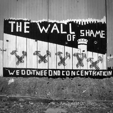 THE WALL OF SHAME 
Mural against the division of Palestine and the illegal occupation by Israels Occupation Forces.